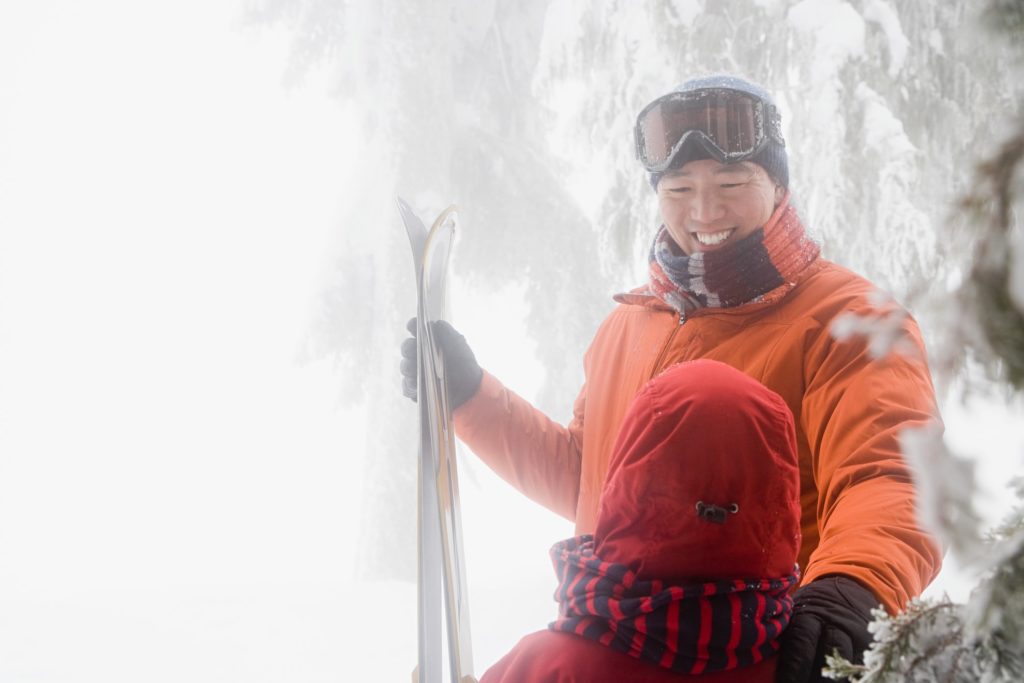 father and son with skis fraser valley cataract laser