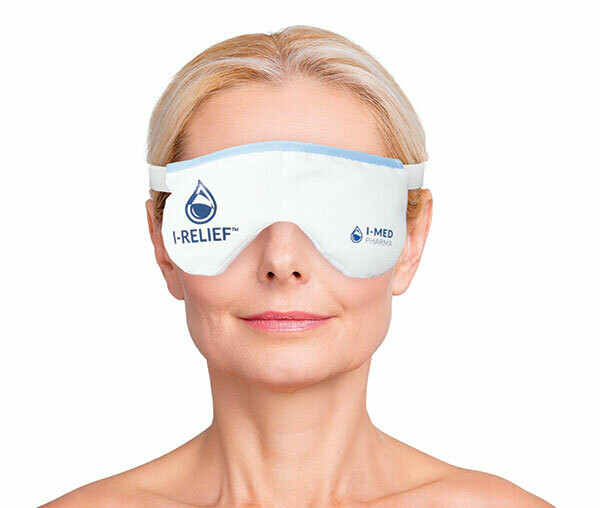 Patient wearing the I-Relief warm compress heat mask for meibomian gland therapy